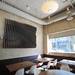 The decor at Lena has a mid-century aesthetic, included Herman Miller lights and wooden sculpture that doubles as a speaker system. Melanie Maxwell I AnnArbor.com